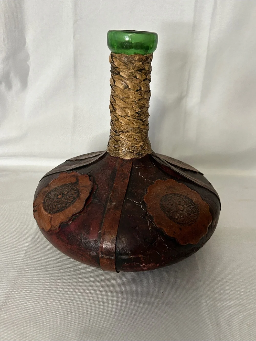 vintage Italian wine decanter covered in hand-tooled brown leather - no stopper
